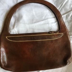 BCBG brown leather clutch.